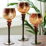 3 supports de bougies en verre, ajoutant une touche élégante à votre décoration.